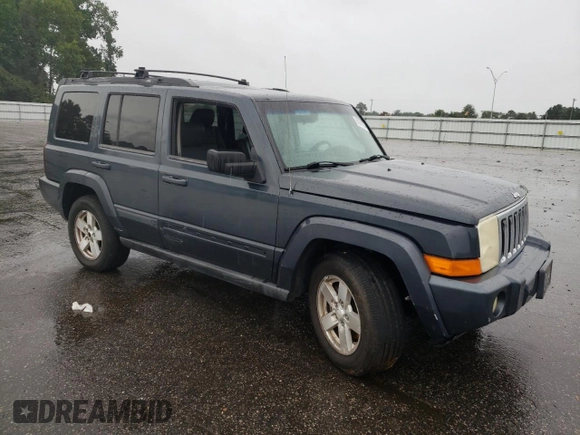 2007 Jeep Commander Sport with VIN 1J8HG48P57C598773, listed as a Copart auction lot 66291824 with 281,211 mi miles and Salvage Title. Bid and sale history available at carsss.com. Image 4.