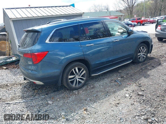 2017 Honda Pilot Touring with VIN 5FNYF6H93HB017623, listed as a IAAI auction lot 41996650 with 97,946 mi miles. Bid and sale history available at carsss.com. Image 4.