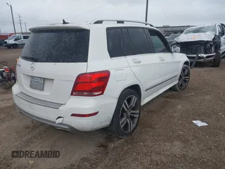 2015 Mercedes-Benz GLK 350 with VIN WDCGG5HB0FG348789, listed as a IAAI auction lot 41886109 with 141,079 mi miles and . Bid and sale history available at DreamBid. Image 4.
