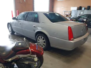 2006 Cadillac DTS w/1SC with VIN 1G6KD57Y46U115629, listed as a IAAI auction lot 41971754 with 149,583 mi miles. Bid and sale history available at carsss.com. Image 3.