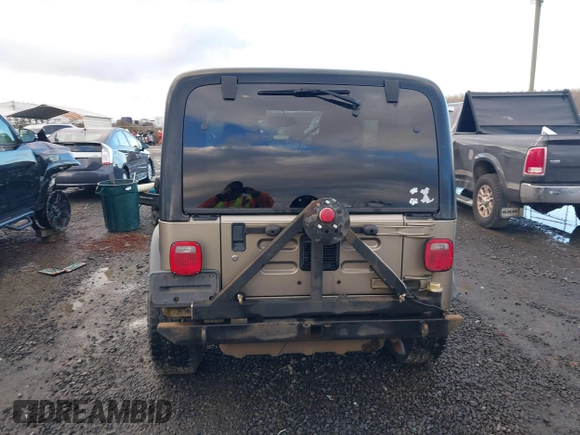 2004 Jeep Wrangler Sport with VIN 1J4FA49S94P711531, listed as a IAAI auction lot 41306863 with 143,720 mi miles and . Bid and sale history available at DreamBid. Image 17.