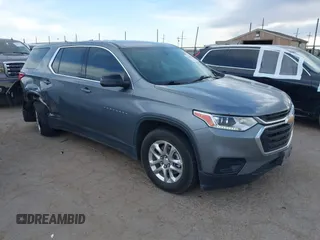 2021 Chevrolet Traverse LS z VIN 1GNERFKW2MJ201129, wystawiony jako IAAI lot #41769338 z przebiegiem 89 807 mil mil oraz . Historia ofert i sprzedaży dostępna na DreamBid. Obrazek 1.