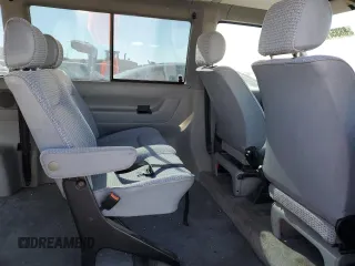 1993 Volkswagen EuroVan с VIN WV2HD0705PH059541, выставлен на аукционе Copart как лот 88357745 с пробегом 88 905 миль миль и Чистый • Clean title. История ставок и продаж доступна на DreamBid. Изображение 11.