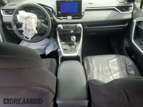 2023 Toyota RAV4 Hybrid SE with VIN JTM16RFVXPD088729, listed as a Copart auction lot 57879395 with 33,249 mi miles and Salvage title. Bid and sale history available at DreamBid. Image 8.