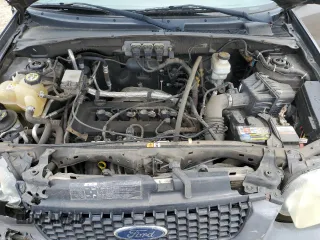 2005 Ford Escape XLS Value with VIN 1FMYU02ZX5KA88548, listed as a Copart auction lot 64025804 with 176,155 mi miles and Salvage Title. Bid and sale history available at carsss.com. Image 12.