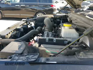 2020 Ram 1500 Big Horn z VIN 1C6RREBT2LN259296, wystawiony jako IAAI lot #42627297 z przebiegiem 90 696 mil mil oraz . Historia ofert i sprzedaży dostępna na DreamBid. Obrazek 20.