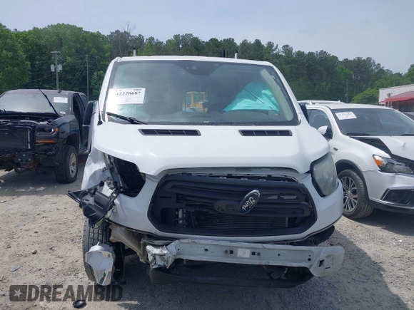 2016 Ford Transit Cargo with VIN 1FTYE1YM6GKB15539, listed as a IAAI auction lot 42228687 with 326,338 mi miles and . Bid and sale history available at DreamBid. Image 6.