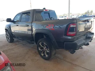 2022 Ram 1500 TRX with VIN 1C6SRFU97NN353587, listed as a IAAI auction lot 42174702 with 35,305 mi miles and . Bid and sale history available at DreamBid. Image 3.