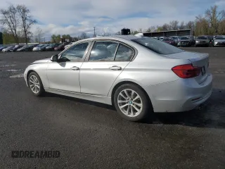 2018 BMW 3 Series 320i with VIN WBA8A9C57JAD27972, listed as a Copart auction lot 51279135 with 64,444 mi miles and Salvage title. Bid and sale history available at DreamBid. Image 2.