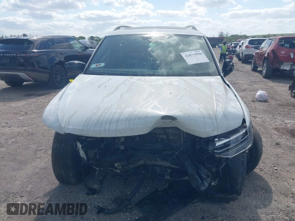 2022 Volkswagen Tiguan SE R-Line Black with VIN 3VVCB7AX5NM040222, listed as a IAAI auction lot 42073998 with 36,225 mi miles and . Bid and sale history available at DreamBid. Image 12.