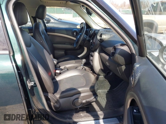 2013 MINI Countryman with VIN WMWZB3C57DWR35414, listed as a IAAI auction lot 41771890 with 141,561 mi miles and . Bid and sale history available at DreamBid. Image 5.