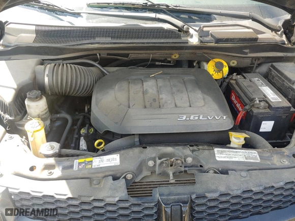 2015 Dodge Grand Caravan American Value Pkg with VIN 2C4RDGBG5FR625961, listed as a Copart auction lot 53966005 with 200,445 mi miles and Clean Title. Bid and sale history available at carsss.com. Image 7.