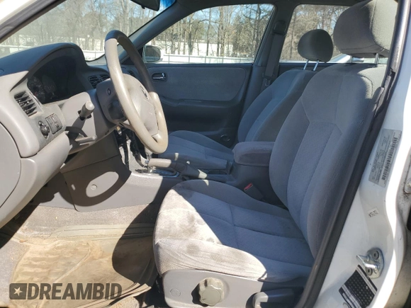 2001 Mazda 626 LX z VIN 1YVGF22C815240640, wystawiony jako Copart lot #47609315 z przebiegiem Nie podano mil oraz Szkoda całkowita • Salvage title. Historia ofert i sprzedaży dostępna na DreamBid. Obrazek 7.