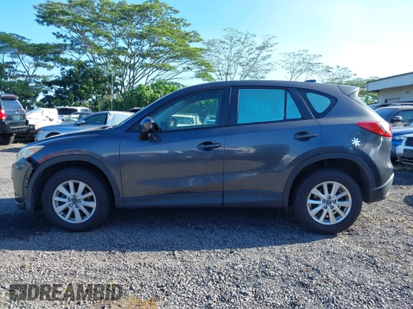 2014 Mazda CX-5 Sport with VIN JM3KE2BE8E0313407, listed as a IAAI auction lot 41215428 with 120,387 mi miles and . Bid and sale history available at carsss.com. Image 14.
