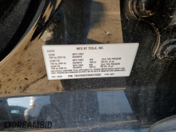 2024 Tesla Model Y Long Range with VIN 7SAYGDEE5RA270382, listed as a Copart auction lot 82899494 with 6,401 mi miles and Clean title. Bid and sale history available at DreamBid. Image 12.