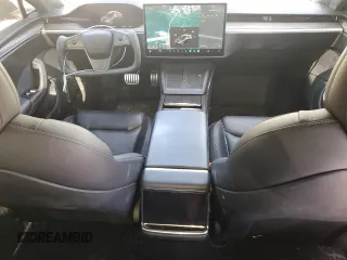 2021 Tesla Model S Plaid with VIN 5YJSA1E63MF451391, listed as a Copart auction lot 54821985 with 50,480 mi miles and Salvage title. Bid and sale history available at DreamBid. Image 8.
