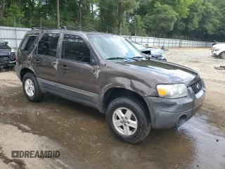 2006 Ford Escape XLS with VIN 1FMYU02Z56KD47674, listed as a Copart auction lot 60668134 with 248,535 mi miles and Salvage Title. Bid and sale history available at carsss.com. Image 4.