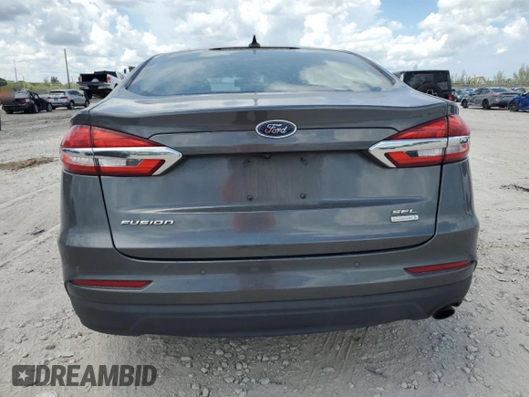 2020 Ford Fusion SEL with VIN 3FA6P0CD5LR177156, listed as a Copart auction lot 65674585 with 123,728 mi miles and Salvage title. Bid and sale history available at DreamBid. Image 6.