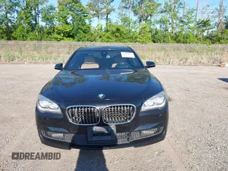 2015 BMW 7 Series 750Li with VIN WBAYE8C50FD781384, listed as a IAAI auction lot 42049829 with 128,087 mi miles and . Bid and sale history available at carsss.com. Image 12.