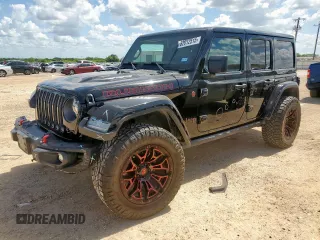 2020 Jeep Wrangler Unlimited Rubicon with VIN 1C4HJXFG5LW107933, listed as a Copart auction lot 62012515 with 60,115 mi miles and Salvage title. Bid and sale history available at DreamBid. Image 1.