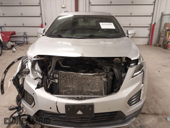2020 Cadillac XT5 Premium Luxury AWD with VIN 1GYKNDRS4LZ166523, listed as a IAAI auction lot 41118646 with 72,216 mi miles and . Bid and sale history available at carsss.com. Image 12.