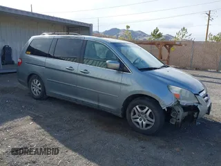 2006 Honda Odyssey TOURING with VIN 5FNRL38896B086011, listed as a IAAI auction lot 41786148 with 257,617 mi miles. Bid and sale history available at carsss.com. Image 1.