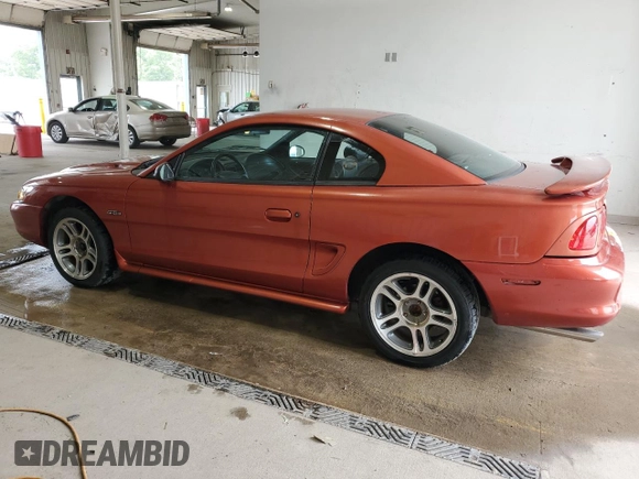1997 Ford Mustang GT with VIN 1FALP42X3VF130827, listed as a Copart auction lot 60529995 with 112,799 mi miles and Salvage title. Bid and sale history available at DreamBid. Image 2.
