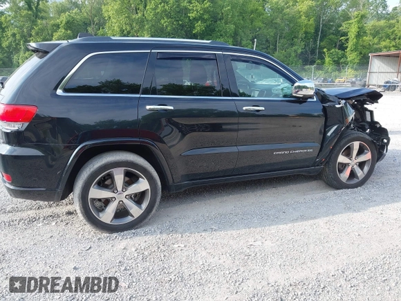 2016 Jeep Grand Cherokee Overland with VIN 1C4RJFCG3GC417699, listed as a IAAI auction lot 42419054 with 109,911 mi miles and . Bid and sale history available at DreamBid. Image 13.