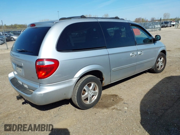 2005 Dodge Caravan SXT with VIN 2D8GP44L75R432427, listed as a IAAI auction lot 42049469 with 129,557 mi miles and . Bid and sale history available at DreamBid. Image 4.