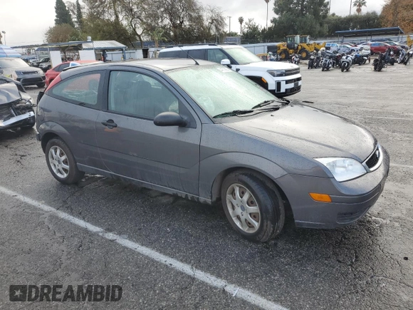 2005 Ford Focus S with VIN 3FAFP31N65R161757, listed as a Copart auction lot 44373605 with 187,145 mi miles and Salvage Title. Bid and sale history available at carsss.com. Image 4.