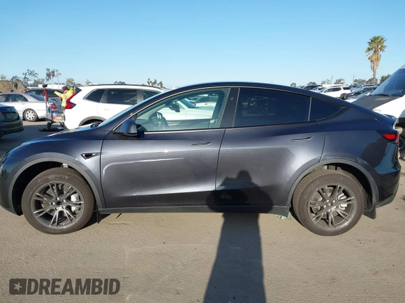 2024 Tesla Model Y with VIN 7SAYGDED5RF103983, listed as a IAAI auction lot 41933836 with 11,398 mi miles and . Bid and sale history available at DreamBid. Image 14.