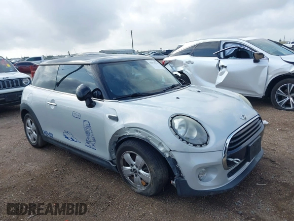 2017 MINI Hardtop Cooper z VIN WMWXP5C35H3C64595, wystawiony jako IAAI lot #42078919 z przebiegiem 93 141 mil mil oraz . Historia ofert i sprzedaży dostępna na DreamBid. Obrazek 13.