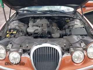 2001 Jaguar S-Type V6 z VIN SAJDA01C51FL84719, wystawiony jako IAAI lot #42192335 z przebiegiem 160 095 mil mil oraz . Historia ofert i sprzedaży dostępna na DreamBid. Obrazek 10.