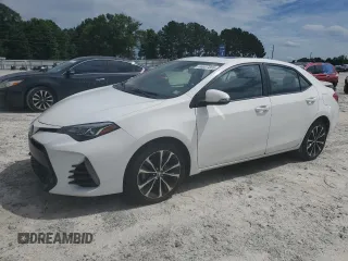 2019 Toyota Corolla L z VIN 5YFBURHE3KP858170, wystawiony jako Copart lot #60027855 z przebiegiem 89 589 mil mil oraz Szkoda całkowita • Salvage title. Historia ofert i sprzedaży dostępna na DreamBid. Obrazek 1.