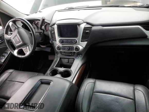 2015 GMC Yukon SLT z VIN 1GKS2BKC1FR112708, wystawiony jako Copart lot #53963165 z przebiegiem 123 331 mil mil oraz Szkoda całkowita • Salvage title. Historia ofert i sprzedaży dostępna na DreamBid. Obrazek 8.