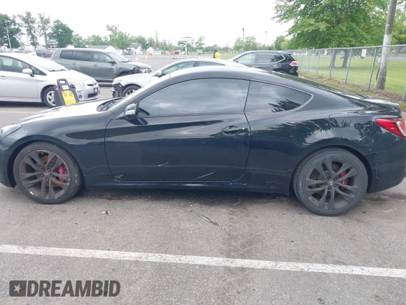2015 Hyundai Genesis Coupe 3.8L Base z VIN KMHHU6KJ7FU126210, wystawiony jako IAAI lot #42371364 z przebiegiem 92 719 mil mil oraz . Historia ofert i sprzedaży dostępna na DreamBid. Obrazek 14.