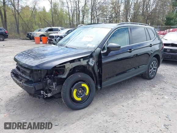 2019 Volkswagen Tiguan SE with VIN 3VV2B7AX7KM174382, listed as a IAAI auction lot 42147584 with 64,460 mi miles and . Bid and sale history available at DreamBid. Image 2.