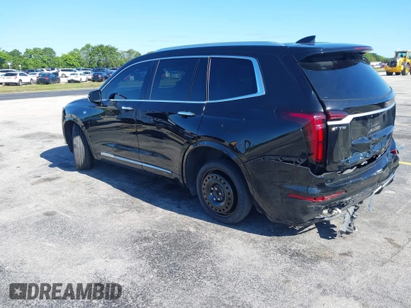 2020 Cadillac XT6 FWD Premium Luxury with VIN 1GYKPCRS7LZ211197, listed as a IAAI auction lot 42231424 with 57,351 mi miles and . Bid and sale history available at DreamBid. Image 3.