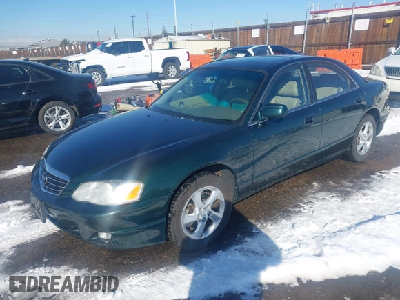 2002 Mazda Millenia z VIN JM1TA221821722812, wystawiony jako IAAI lot #41405990 z przebiegiem 117 926 mil mil oraz . Historia ofert i sprzedaży dostępna na DreamBid. Obrazek 2.