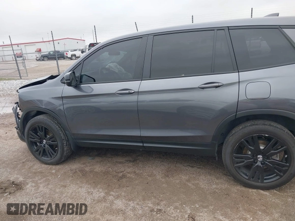 2021 Honda Passport Sport with VIN 5FNYF8H26MB032206, listed as a IAAI auction lot 42282932 with 18,952 mi miles and . Bid and sale history available at DreamBid. Image 14.