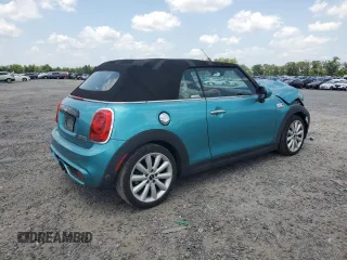 2018 MINI Convertible Cooper S with VIN WMWWG9C59J3D22587, listed as a Copart auction lot 61673415 with 34,935 mi miles and Salvage title. Bid and sale history available at DreamBid. Image 3.