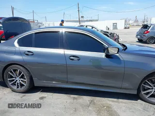 2020 BMW 3 Series 330i z VIN 3MW5R1J03L8B17207, wystawiony jako IAAI lot #42090508 z przebiegiem 105 982 mil mil oraz . Historia ofert i sprzedaży dostępna na DreamBid. Obrazek 13.