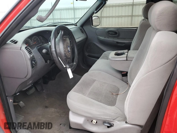 2003 Ford F-150 XL с VIN 1FTRF07WX3KB82234, выставлен на аукционе Copart как лот 43470425 с пробегом 147 129 миль миль и Списание • Salvage title. История ставок и продаж доступна на DreamBid. Изображение 7.
