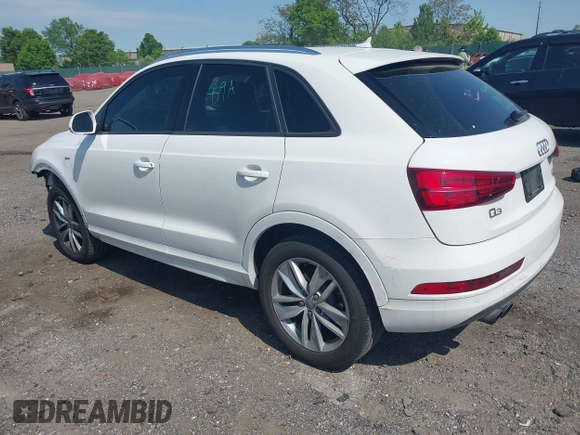 2018 Audi Q3 Premium with VIN WA1ECCFS3JR016577, listed as a IAAI auction lot 42177891 with 91,876 mi miles and . Bid and sale history available at DreamBid. Image 3.
