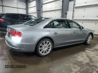 2014 Audi A8 3.0T z VIN WAURGAFD7EN005416, wystawiony jako Copart lot #42625745 z przebiegiem 141 244 mil mil oraz Szkoda całkowita • Salvage title. Historia ofert i sprzedaży dostępna na DreamBid. Obrazek 3.
