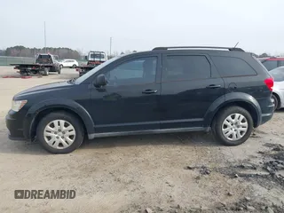 2013 Dodge Journey SE with VIN 3C4PDCAB0DT702977, listed as a IAAI auction lot 41797817 with 150,317 mi miles. Bid and sale history available at carsss.com. Image 12.