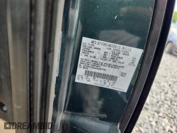 2004 Ford F-150 XL with VIN 1FTPX12564NA87792, listed as a Copart auction lot 60489655 with 396,269 mi miles and Salvage title. Bid and sale history available at DreamBid. Image 13.