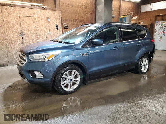 2018 Ford Escape SEL with VIN 1FMCU9HDXJUB39135, listed as a Copart auction lot 52093075 with 69,604 mi miles and Salvage Title. Bid and sale history available at carsss.com. Image 1.