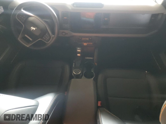 2023 Ford Bronco with VIN 1FMEE5DP9PLB29838, listed as a Copart auction lot 62409785 with 11,124 mi miles and Salvage title. Bid and sale history available at DreamBid. Image 8.