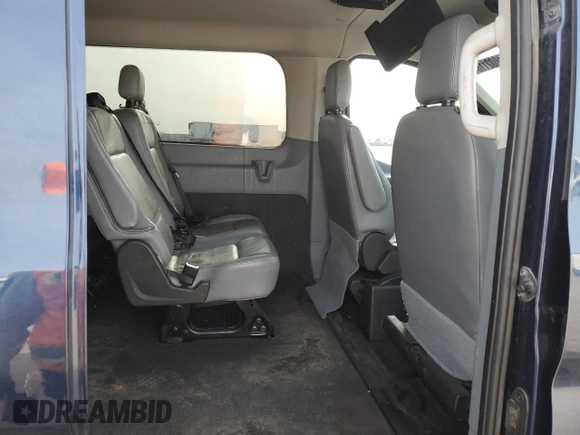 2015 Ford Transit Passenger XL с VIN 1FMZK1YG2FKB25633, выставлен на аукционе Copart как лот 51002115 с пробегом 183 255 миль миль и Списание • Salvage title. История ставок и продаж доступна на DreamBid. Изображение 11.